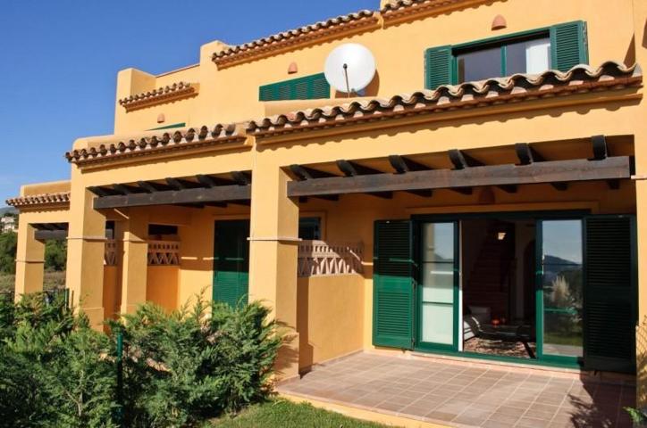 Adosada en venta en Finestrat, Alicante photo 0