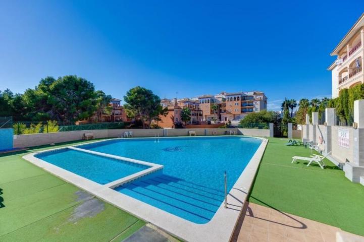 Apartamento en venta en Orihuela Costa, Playa Flamenca photo 0