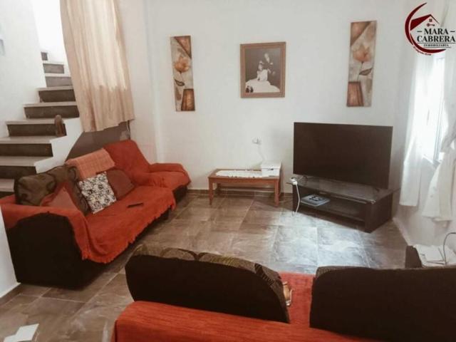 Adosada en venta en Casinos photo 0