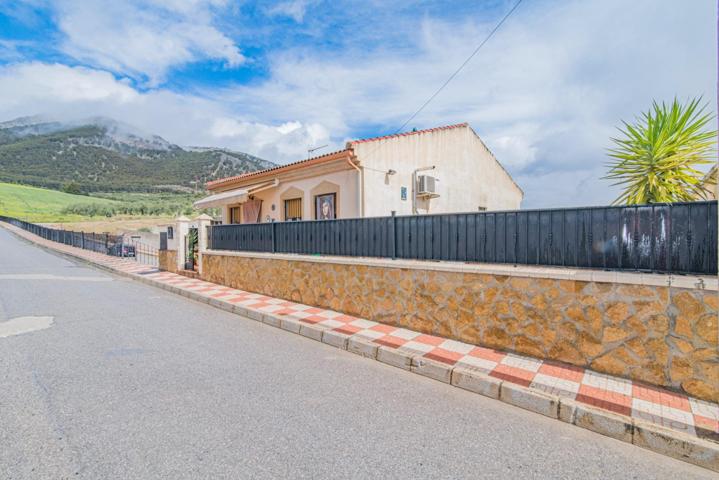 Casa Reformada en Planta Baja con Amplio Patio y Estacionamiento. photo 0