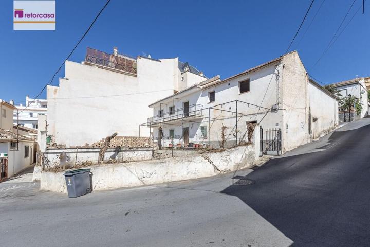 VIVIENDA EN CALLE PRINCIPAL DEL BARRIO DE MONACHIL CON MÚLTIPLES POSIBILIDADES (500 M2 SUPERFICIE TOTAL) photo 0
