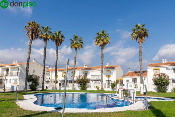 CASA ADOSADA CON PISCINA EN SALOBREÑA, PRIMERA LINEA DE PLAYA photo 0