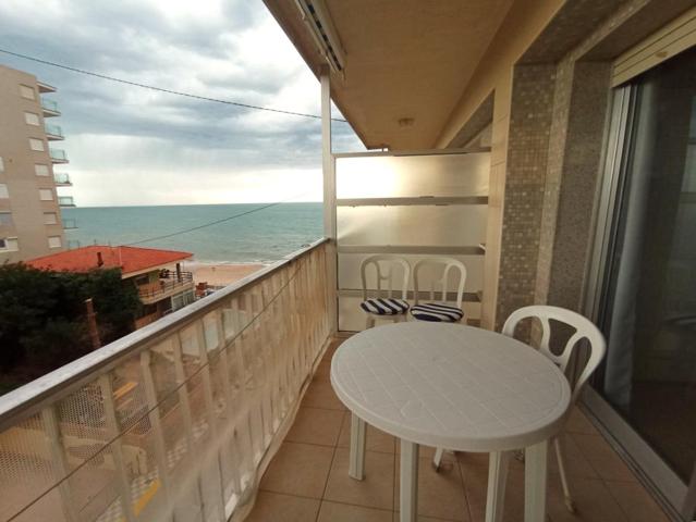 Apartamento de 1 dormitorio con parking en primera línea lateral de playa de Bellreguard photo 0