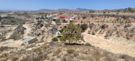 SE VENDE CASA CUEVA CON TERRENO JUNTO AL RÍO CHÍCAMO photo 0