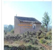 Venta de parcela rústica con Casita de piedra photo 0