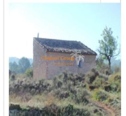 Venta de parcela rústica con Casita de piedra photo 0