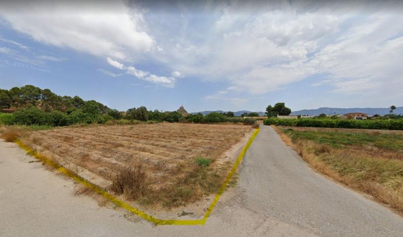 SE VENDE TERRENO JUNTO CASTILLO LARACHE photo 0