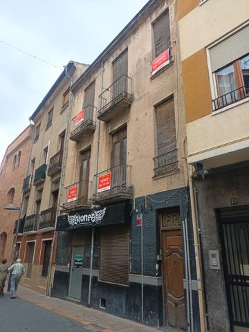 Oportunidad Única en el Corazón de la Ciudad: vivienda con múltiples posibilidades photo 0
