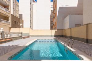 Acogedor piso en planta baja con piscina comunitaria photo 0