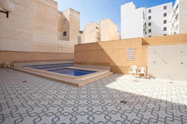Piso en planta baja con 2 dormitorios, patio, piscina y licencia turística a 850 m de la Playa de la Acequión photo 0