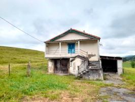 Casa de piedra con terreno para reformar en Riotuerto photo 0