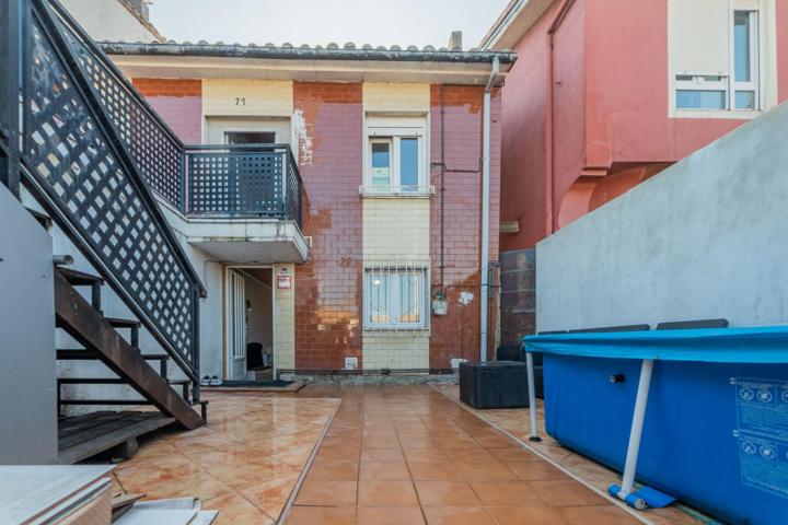 Oportunidad única: casa pareada con dos viviendas independientes y garaje photo 0