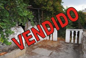 VENTA DOS CASAS PLANTA BAJA CON PATIO Y TERRENO photo 0