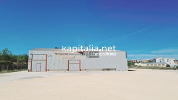 Nave industrial y terreno en venta y alquiler en Ontinyent photo 0