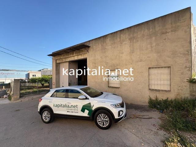 NAVE COMERCIAL SOBRE PARCELA DE TERRENO A LA VENTA EN LA LLOSA DE RANES photo 0