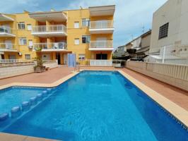 Planta baja con piscina comunitaria en playa de Miramar photo 0