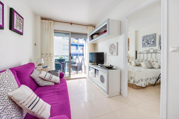 Impecable apartamento de dos dormitorios en edificio Orbiplaya, con piscina comunitaria y garaje incluido photo 0