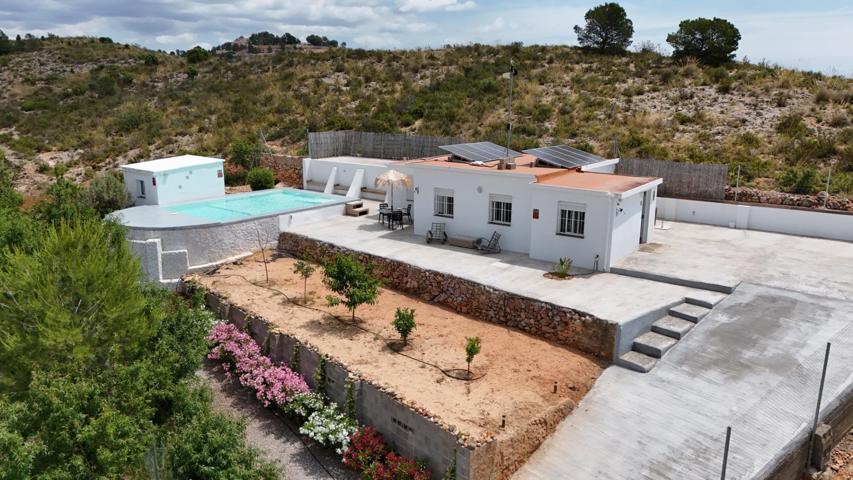Encantadora villa de estilo ibicenco totalmente reformada en Lliria photo 0