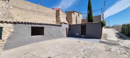 Venta de casa cueva con patio en Lumpiaque photo 0