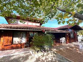Preciosa casa de Madera en un entorno privilegiado photo 0