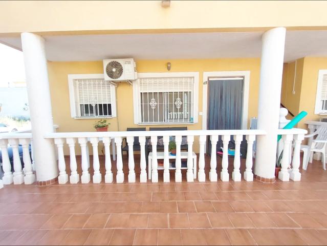 Venta de bungalow en Daya Nueva con piscina comunitaria photo 0