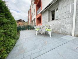 Piso en planta baja con jardín privado y terraza en Arredondo – Urbanización con piscina y garaje incluido photo 0