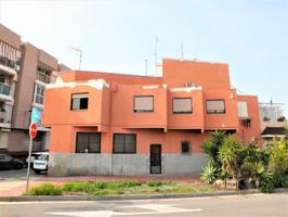 Edificio de 2 plantas con 4 dormitorios 3 baños, solárium, local bajo y dos entradas photo 0