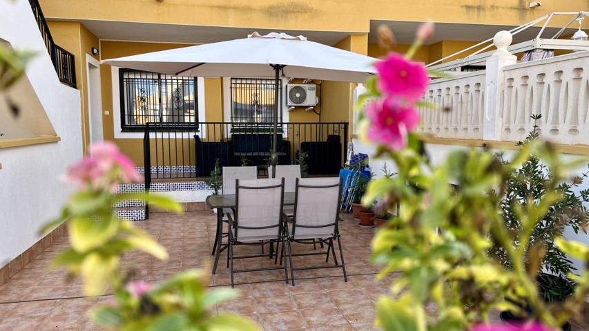 Bungalow planta baja de dos dormitorios con una gran terraza piscina y garaje listo para vivir photo 0