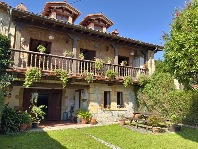 CASA CON JARDIN EN LIANDRES photo 0