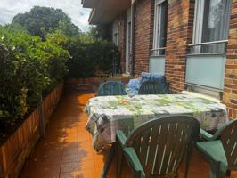 Planta baja con terraza en Urbanización con Piscina photo 0