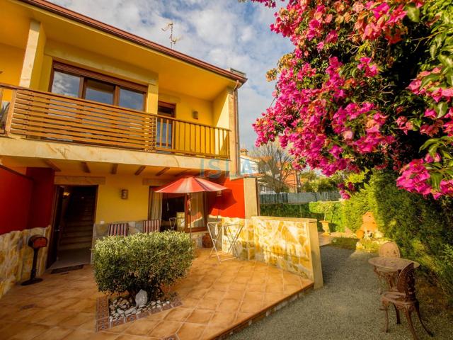 Tranquilidad y comodidad en Isla: chalet adosado con jardín y todas las mejoras photo 0