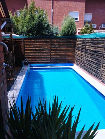 CHALET ADOSADO CON PISCINA photo 0