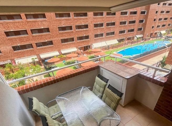 Apartamento con Terraza y Vistas a la Piscina en Edificio Playa Coral I (con Garaje y Trastero). photo 0