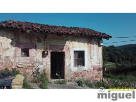 Se vende casa de piedra para rehabilitar con jardín en Cades photo 0