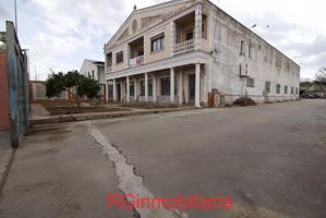 Nave industrial con piso en venta en polígono Isaac Peral de Don Benito photo 0