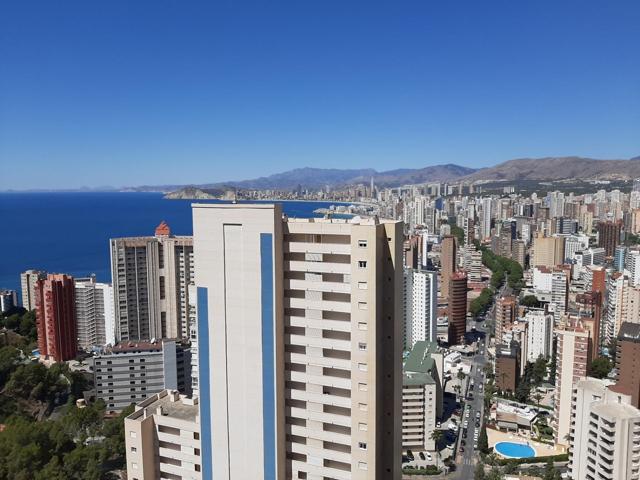Apartamento con 2 dormitorios y vistas espectaculares al mar y Benidorm. photo 0