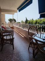 Apartamento con amplia terraza con vistas al mar junto a la playa photo 0
