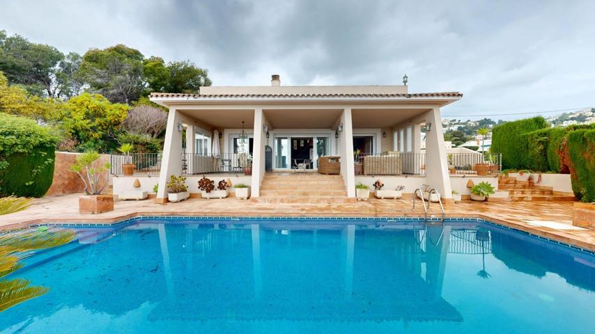 IMPRESIONANTE CHALET EN LA PLAYA DE MORAIRA photo 0