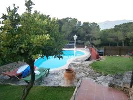 Casa en Urbanización Les Teules, reformada. Parcela de 685 m2. photo 0