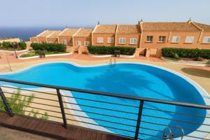 CHALET ADOSADO CON PISCINA EN COSTANERA photo 0