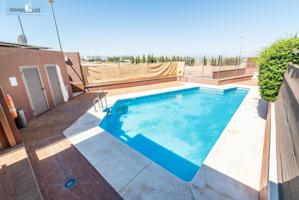 PRECIOSA CASA EN JUN CON PISCINA COMUNITARIA photo 0