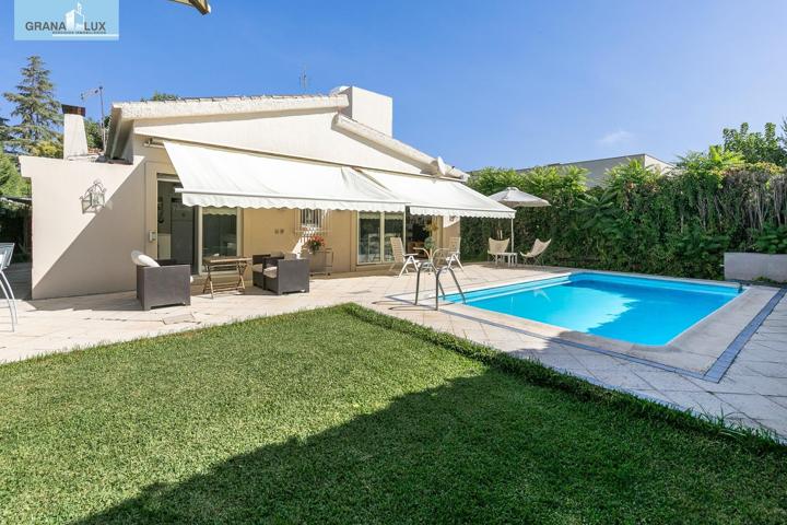 CHALET CON PARCELA Y PISCINA EN URBANIZACIÓN LOS CHOPOS. photo 0
