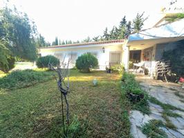 PARCELA DE 2600 METROS CON CHALET photo 0