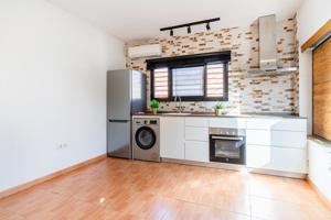 VIVIENDA + LOCAL EN FUENTE AMARGA photo 0