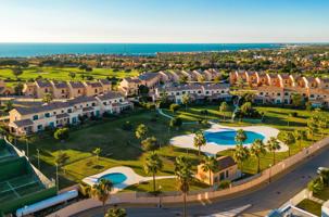 Un paraíso en la playa y el golf: vivienda en esquina con jardín photo 0