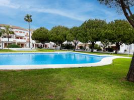 Apartamento en planta baja a 700 m2 de la playa La Barrosa photo 0