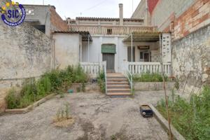 AMPLIA CASA DE PUEBLO EN LA LLOSA photo 0