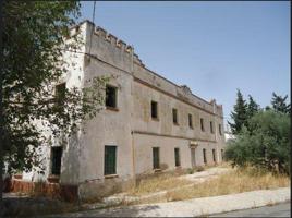 Parcela de terreno con edificio en Antequera (Málaga) photo 0