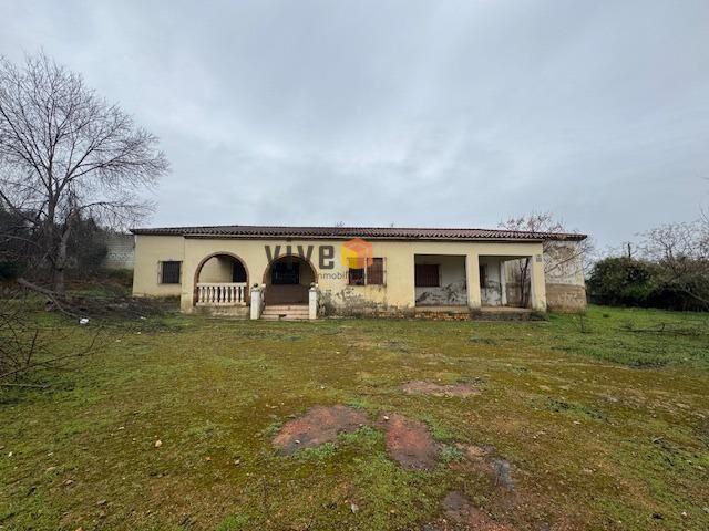 PARCELA CON VIVIENDA EN VENTA photo 0