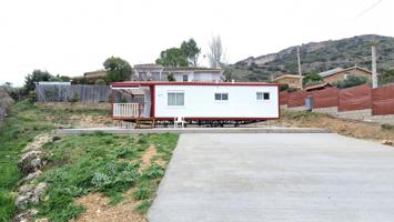 Se vende terreno con casa prefabricada photo 0